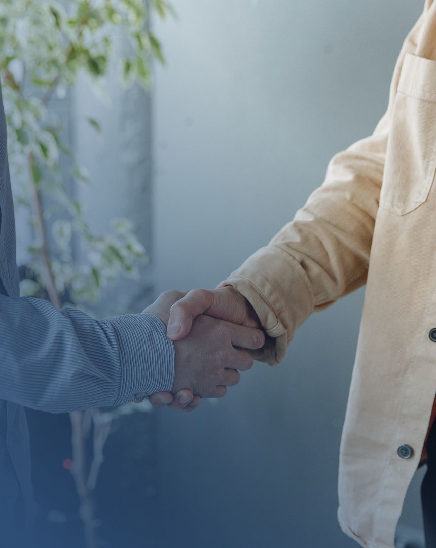 Attorney and client shaking hands